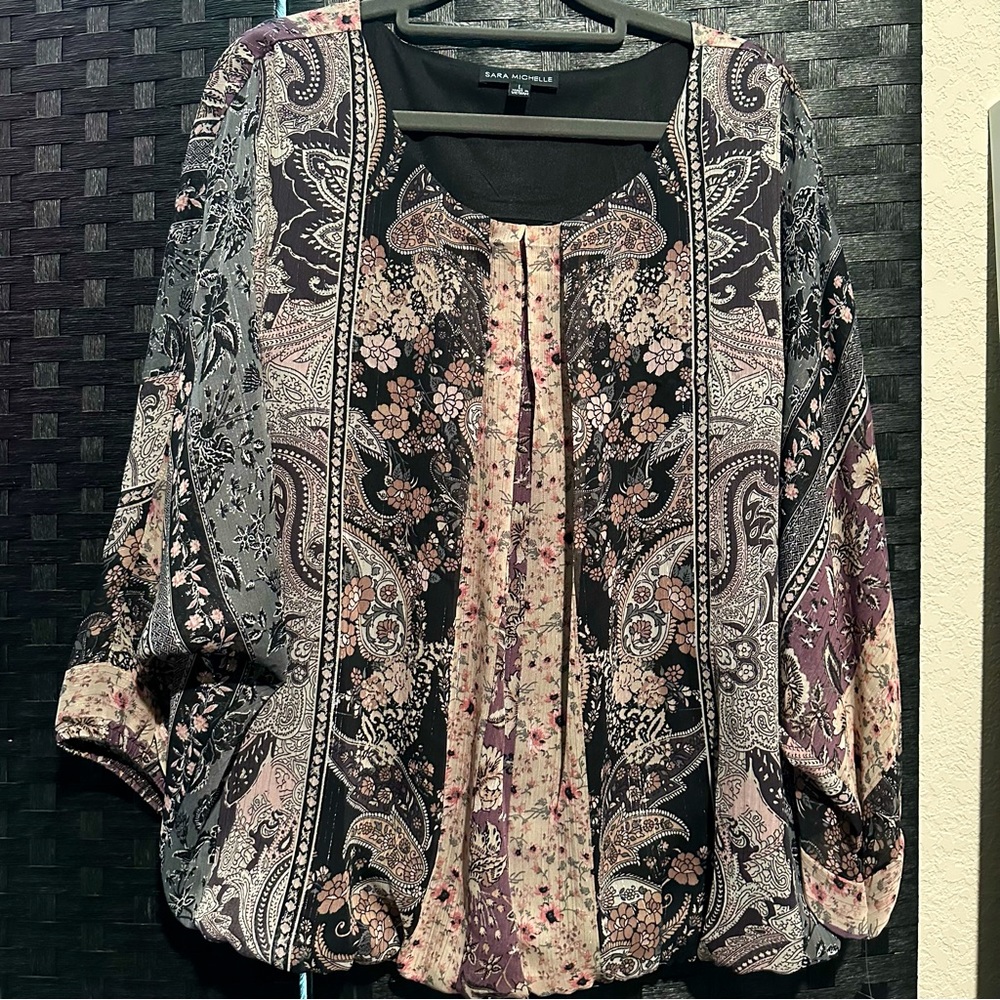 Sara Michelle ¾ sleeve bubble hemmed top